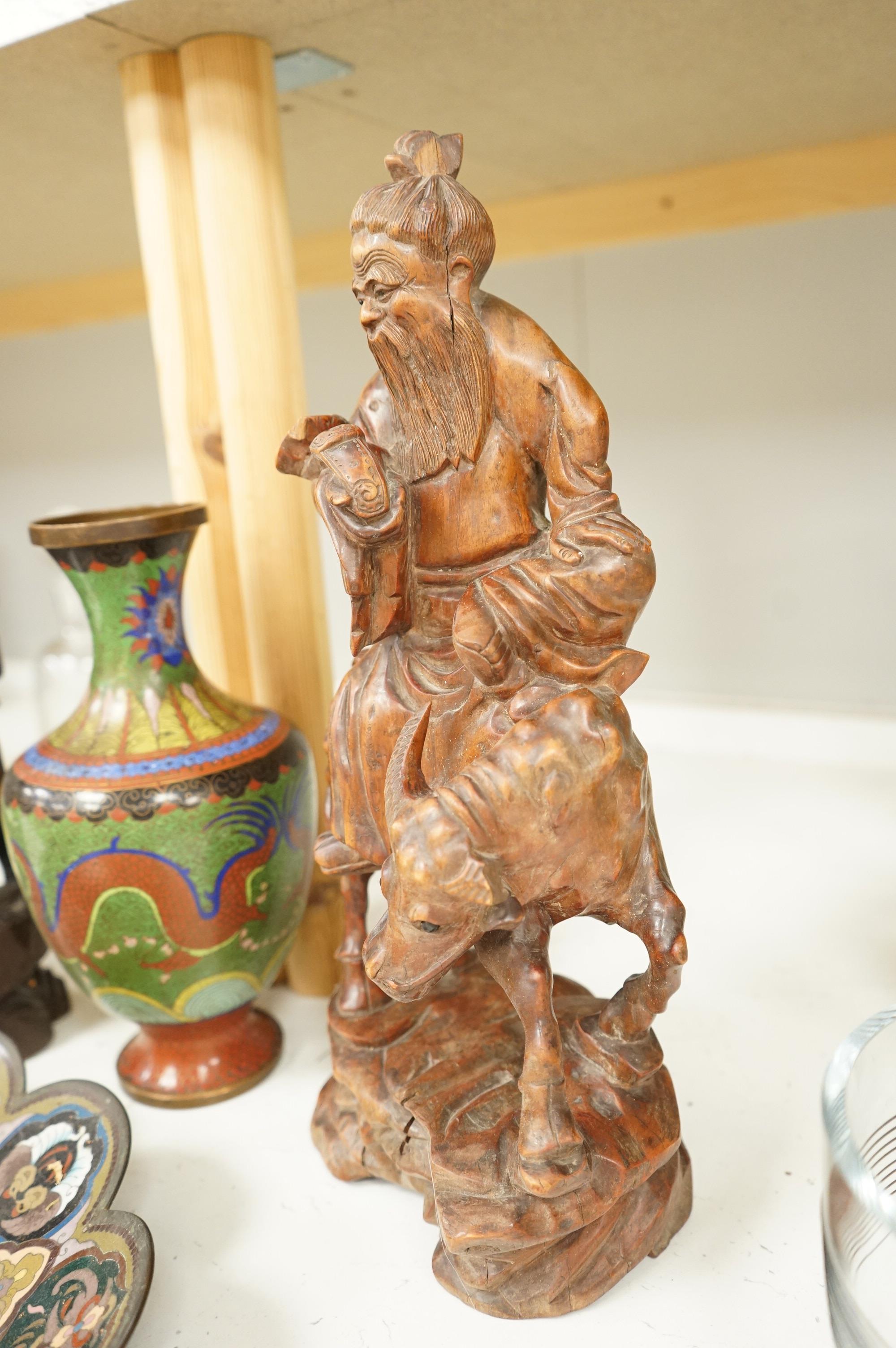 A Japanese cloisonné enamel dish, a Chinese cloisonné enamel vase and three Chinese carved wood figures, largest 39cm high